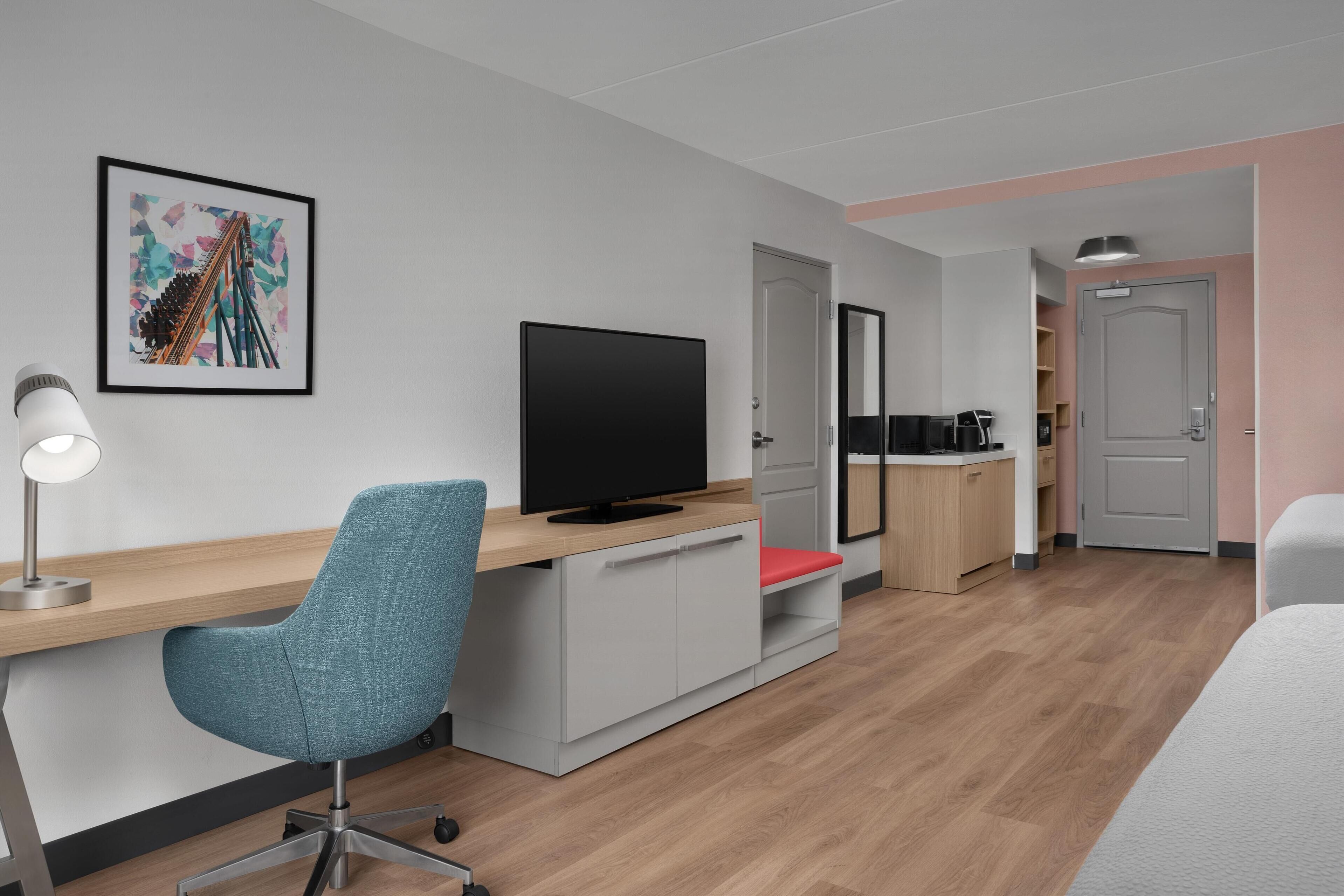 premium bedding, desk, laptop workspace, iron/ironing board