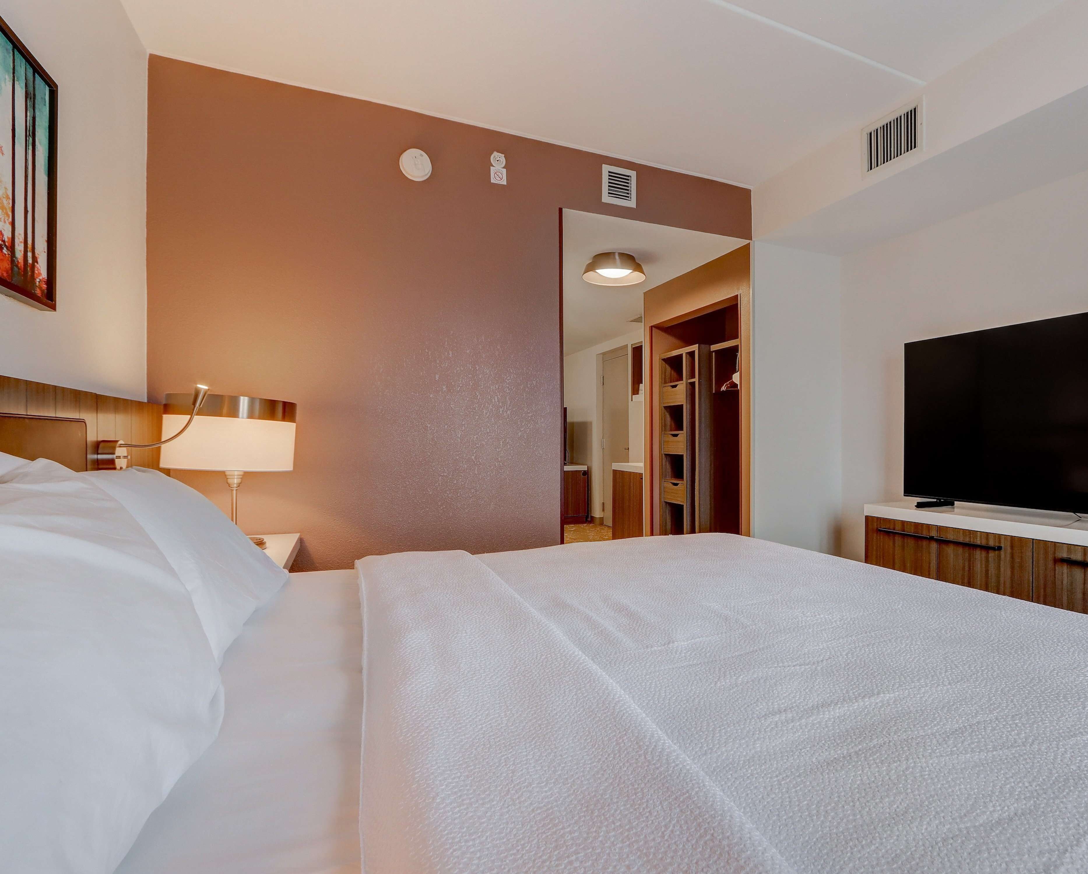 desk, blackout curtains, iron/ironing board, free cots/infant beds