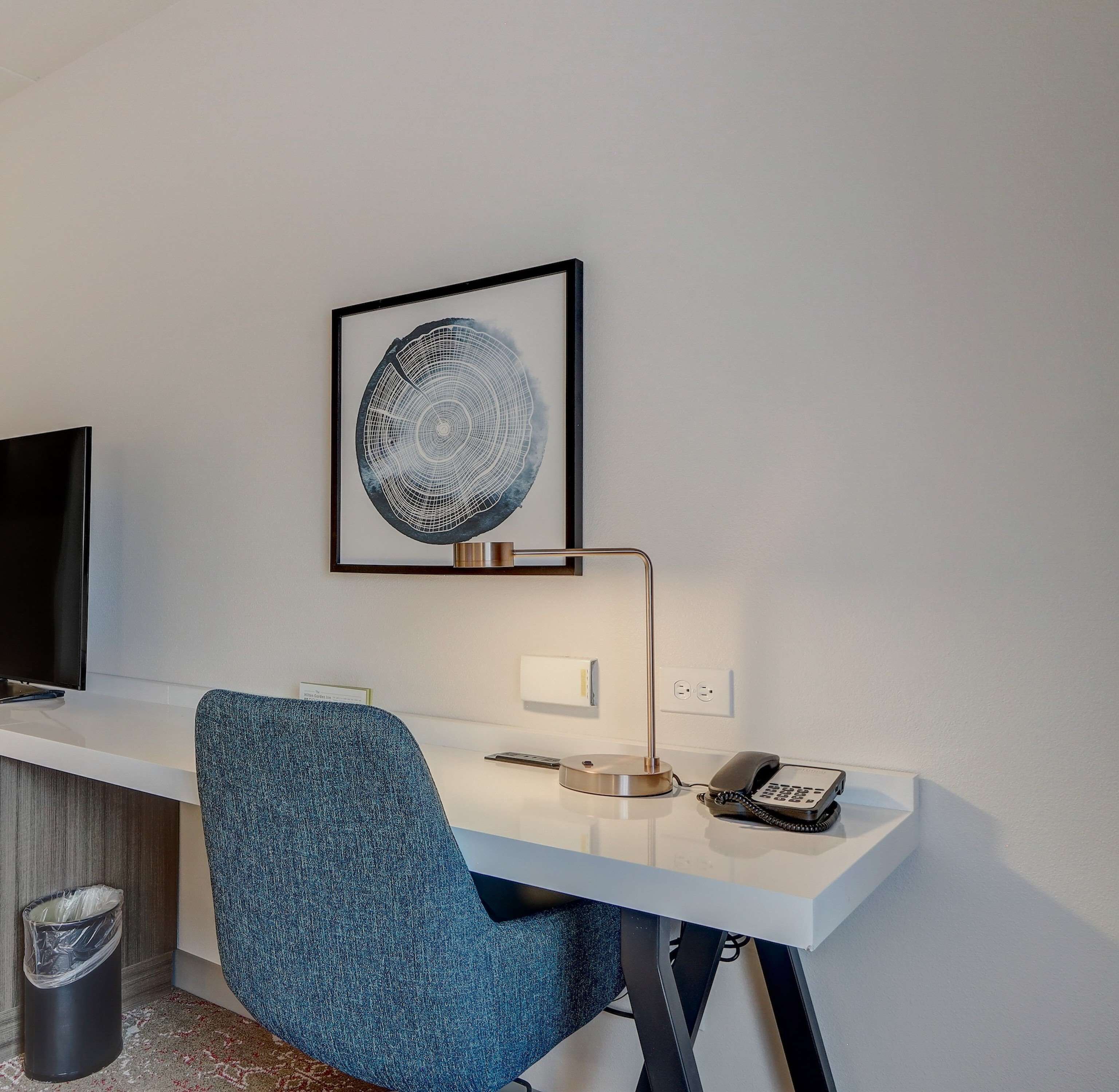 desk, blackout curtains, iron/ironing board, free cots/infant beds