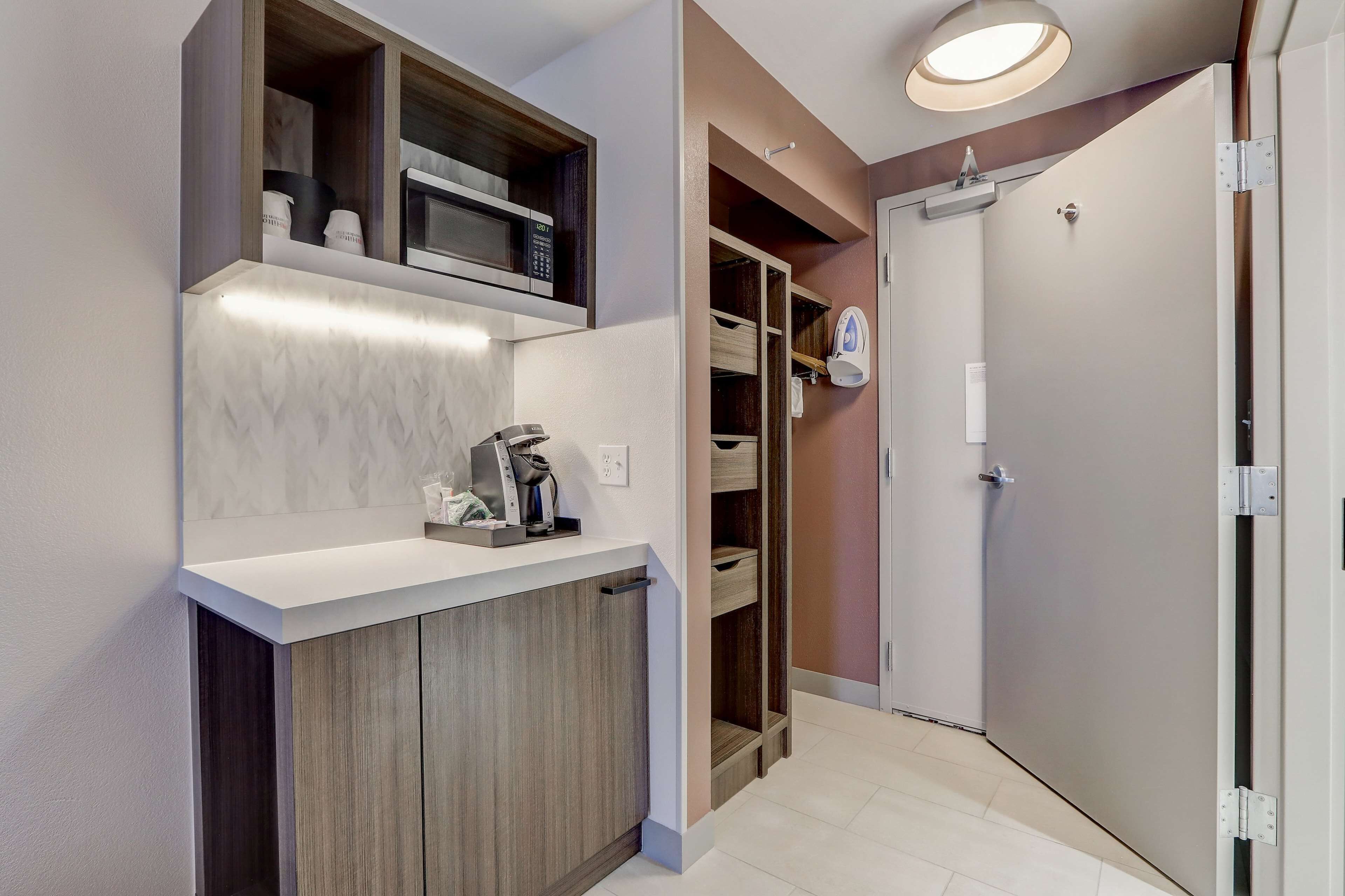 desk, blackout curtains, iron/ironing board, free cots/infant beds