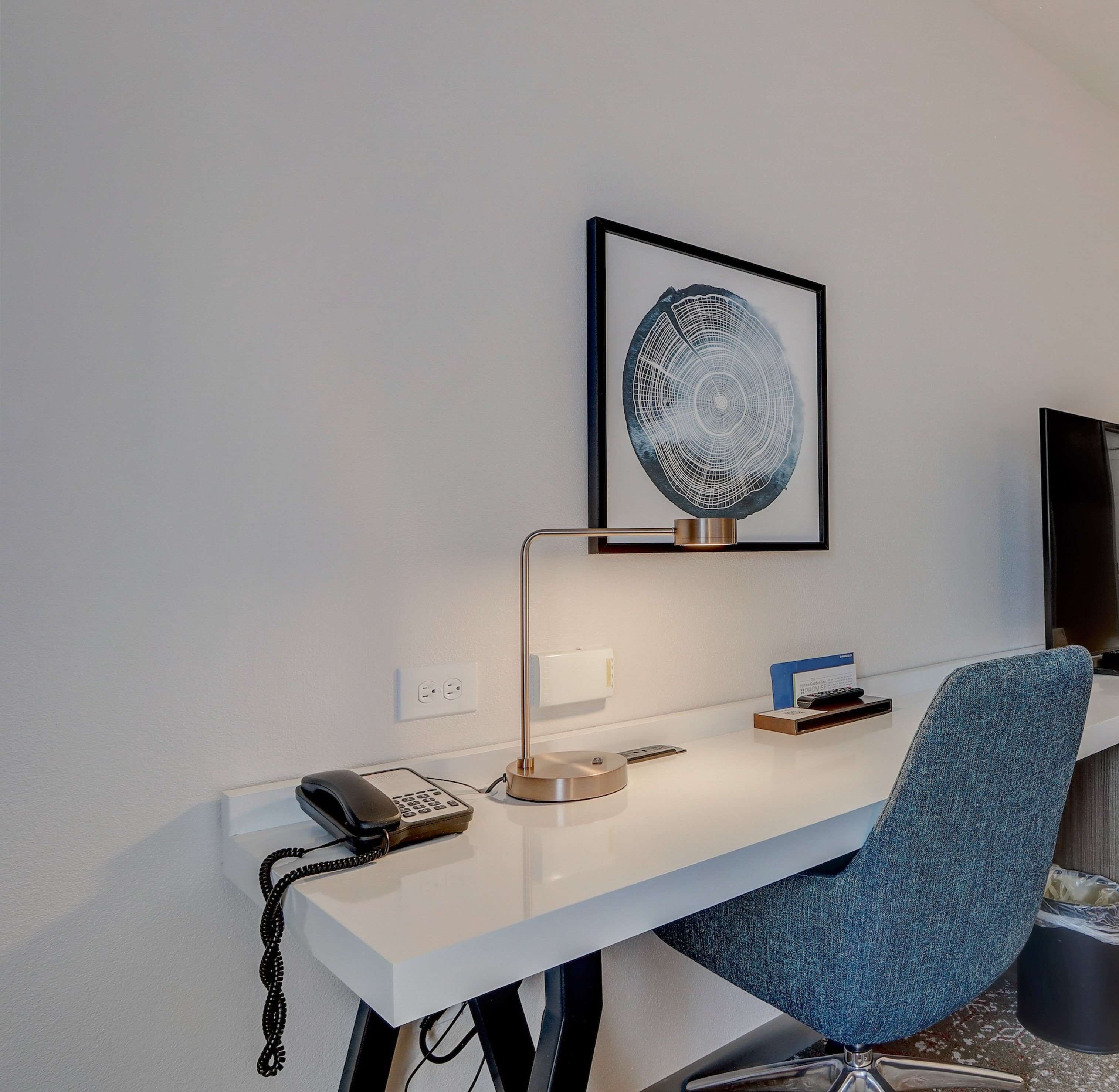 desk, blackout curtains, iron/ironing board, free cots/infant beds