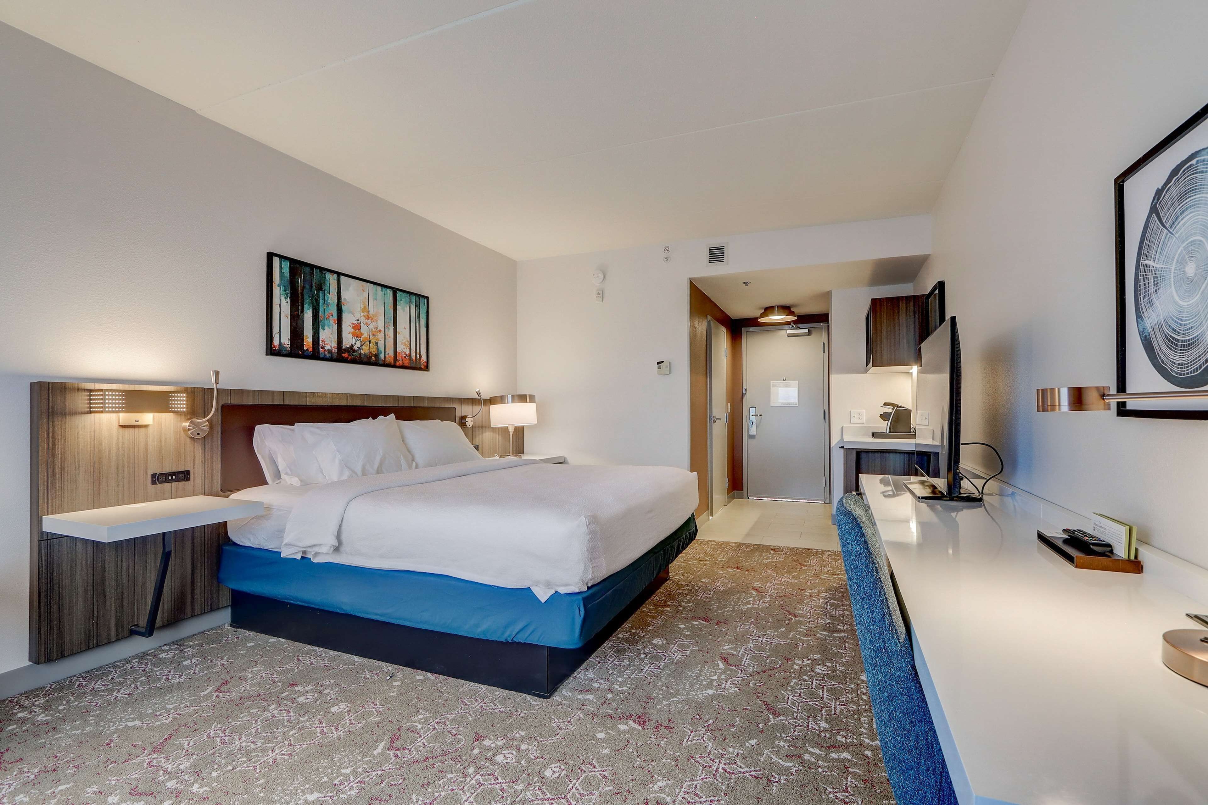 desk, blackout curtains, iron/ironing board, free cots/infant beds