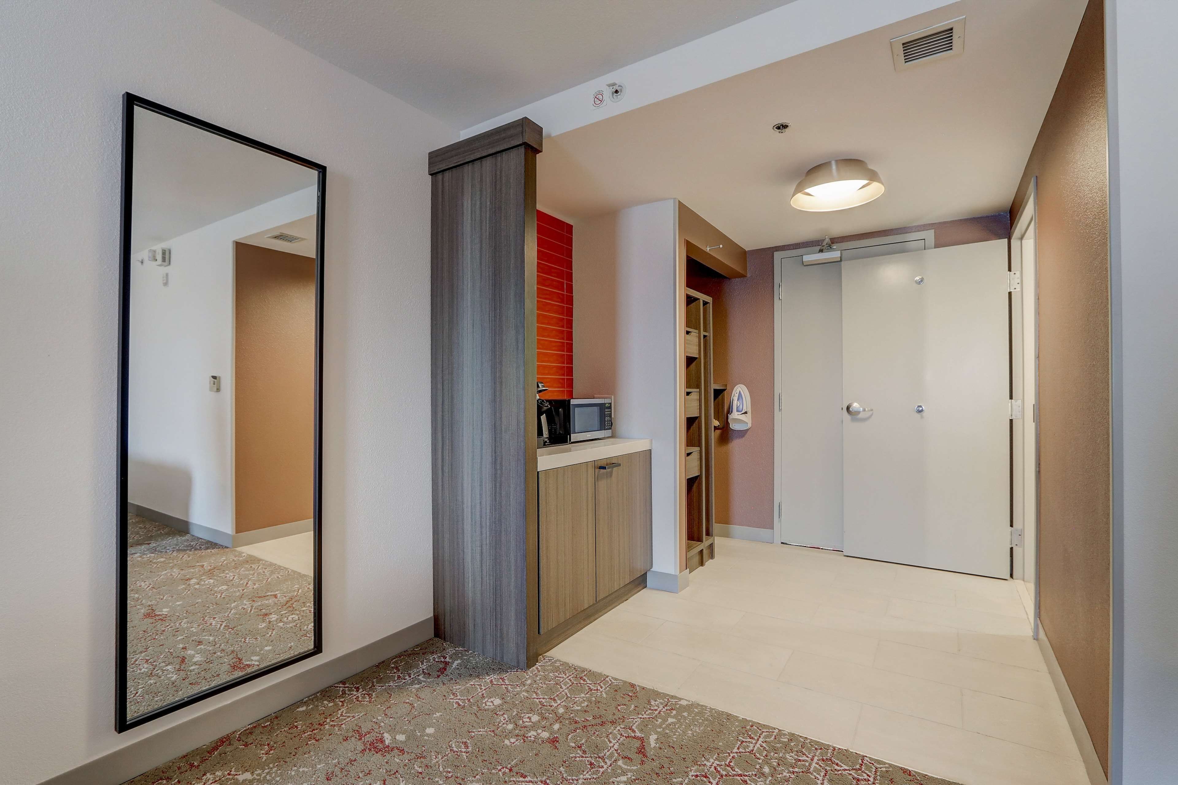 desk, blackout curtains, iron/ironing board, free cots/infant beds