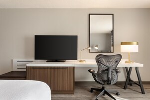 Premium bedding, down comforters, desk, laptop workspace