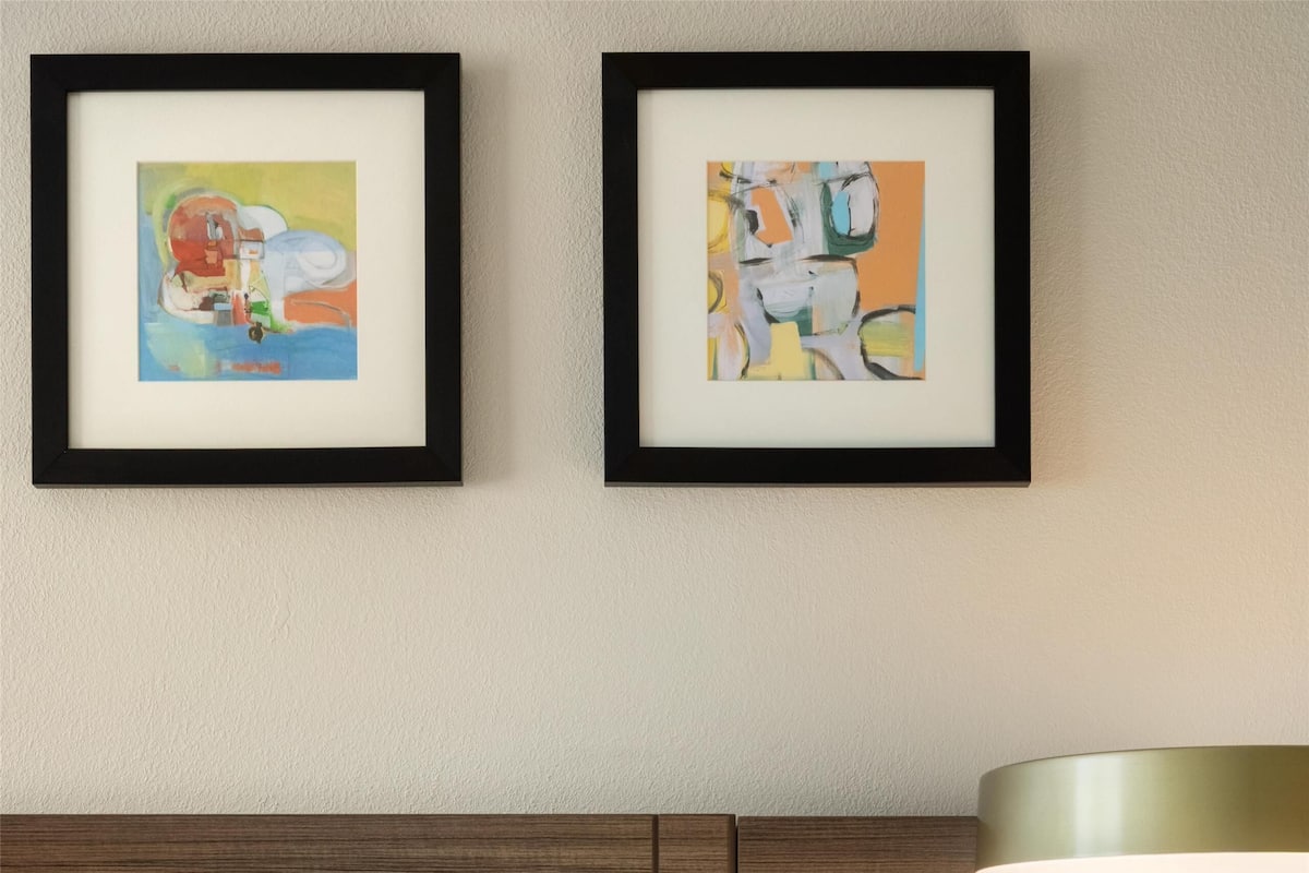 Premium bedding, down duvets, desk, laptop workspace