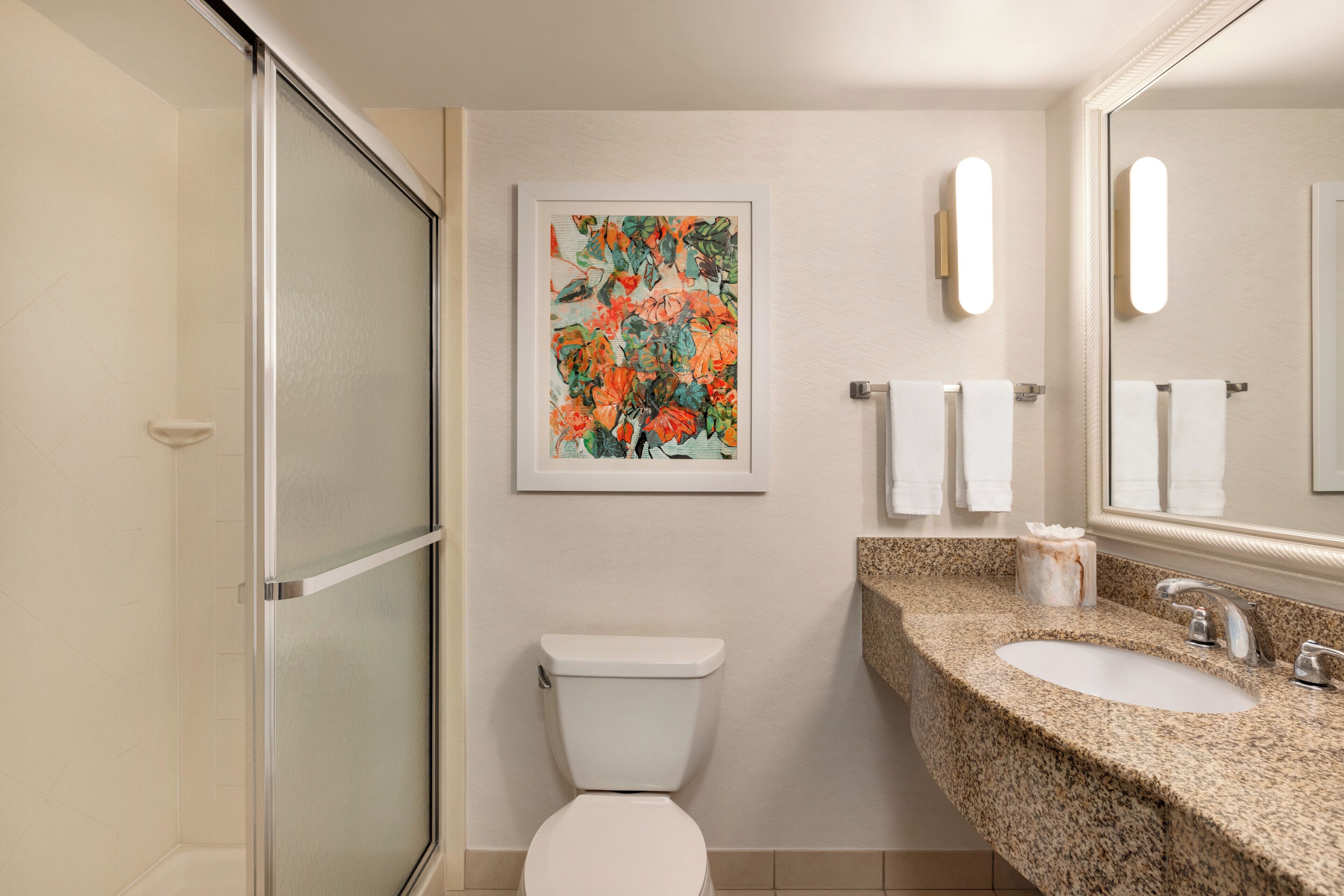 eco-friendly toiletries, hair dryer, towels, soap