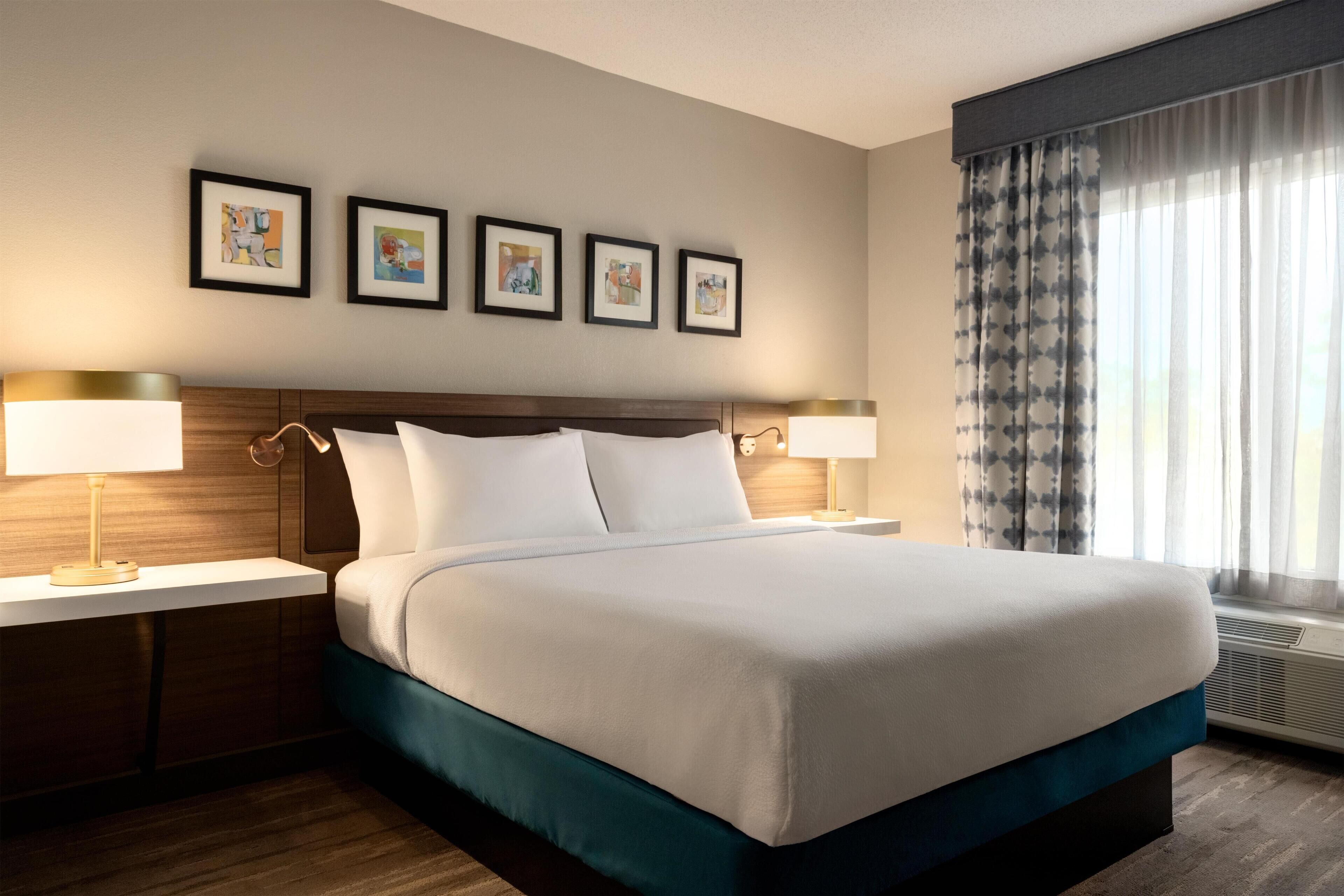 Premium bedding, down comforters, desk, laptop workspace