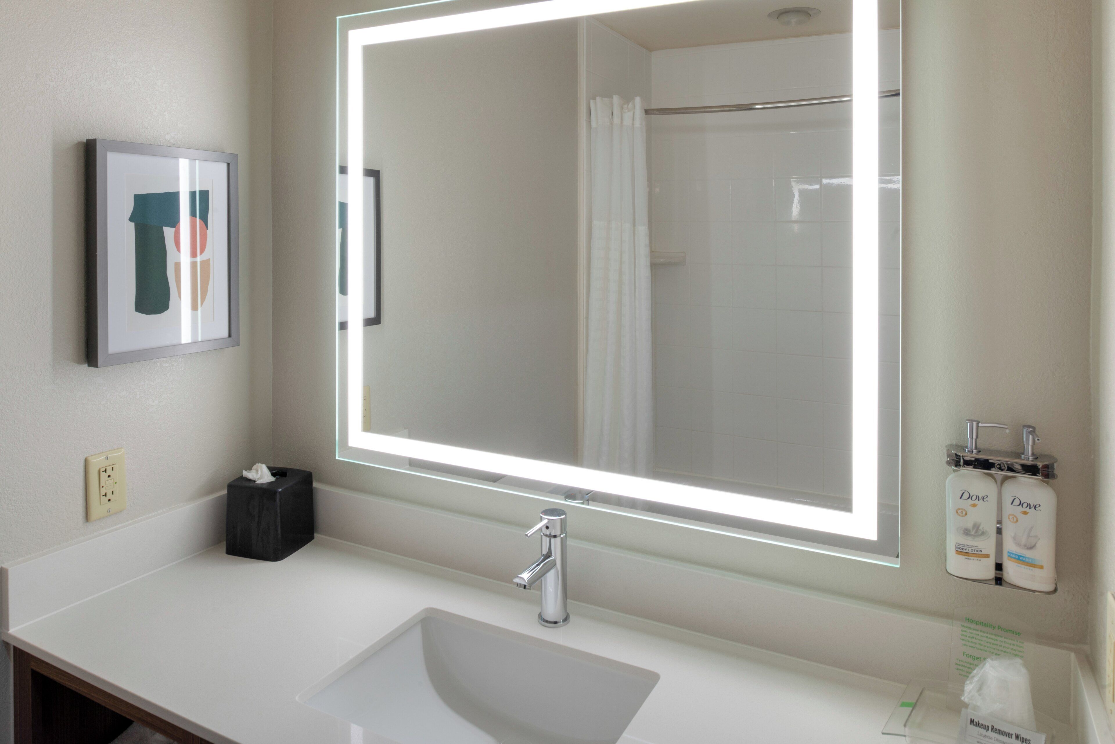 combined shower/bathtub, free toiletries, hair dryer, towels