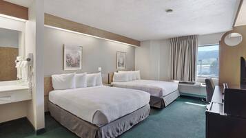 Standaard kamer, 2 queensize bedden | Een bureau, gratis wifi, beddengoed