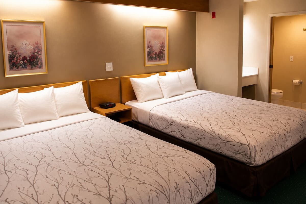 Deluxe Room, 2 Queen Beds, Refrigerator | Desk, free WiFi, bed sheets