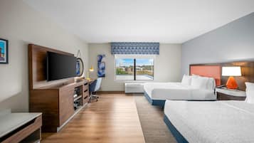 Ropa de cama de alta calidad y caja de seguridad en la habitación