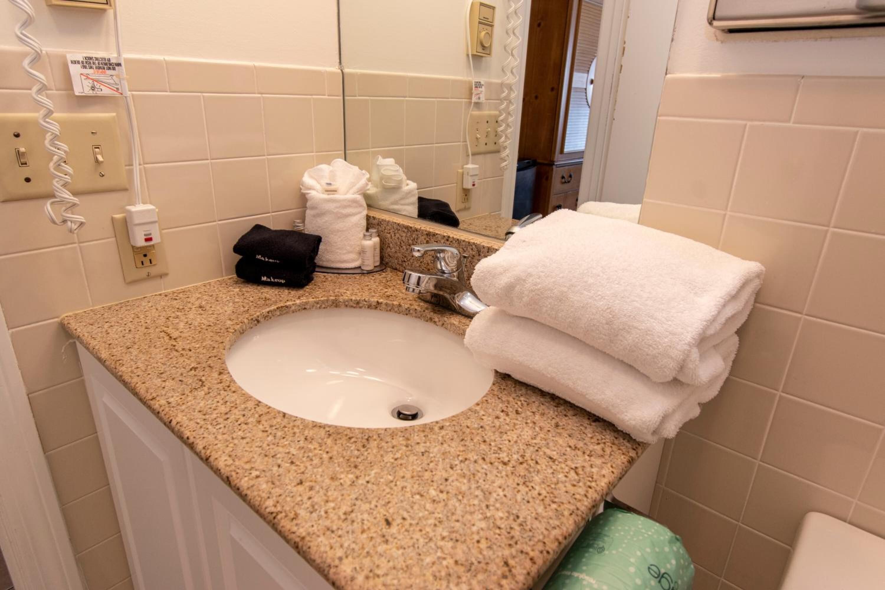 combined shower/bathtub, free toiletries, hair dryer, towels