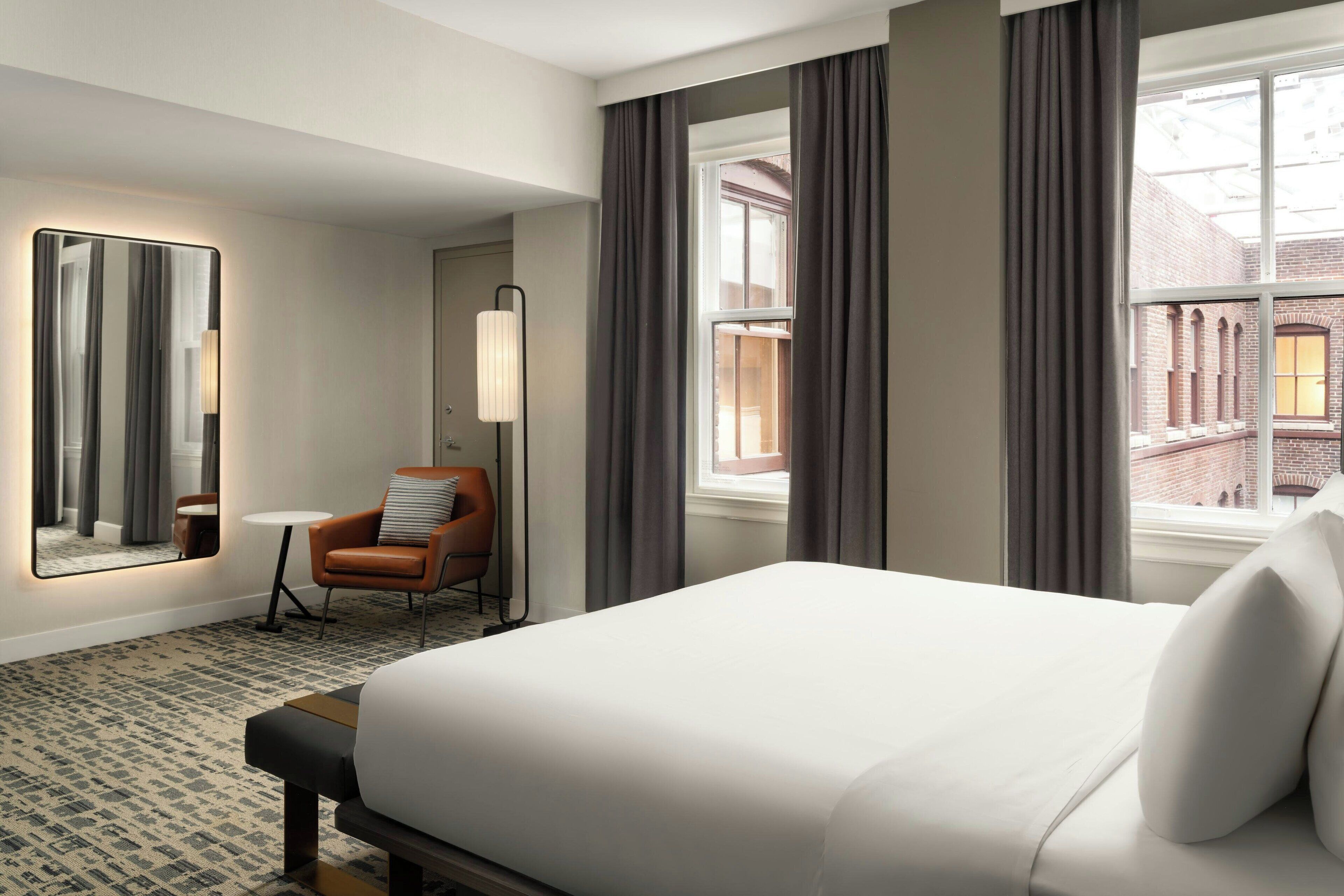 Hypo-allergenic bedding, down duvets, pillow-top beds, in-room safe