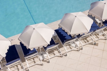 3 outdoor pools, pool umbrellas, sun loungers at The Seagate