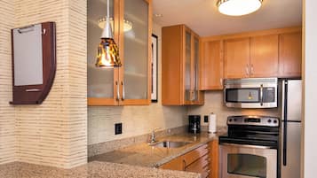 Suite, 2 Bedrooms | Private kitchenette | Full-sized fridge, microwave, stovetop, dishwasher