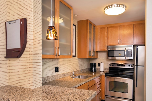 Suite, 2 Bedrooms | Private kitchenette | Full-sized fridge, microwave, stovetop, dishwasher