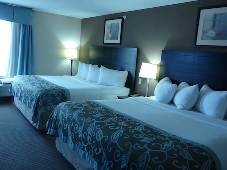 Desk, laptop workspace, iron/ironing board, free cribs/infant beds