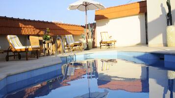 Seasonal outdoor pool, open 10 AM to 9 PM, sun loungers
