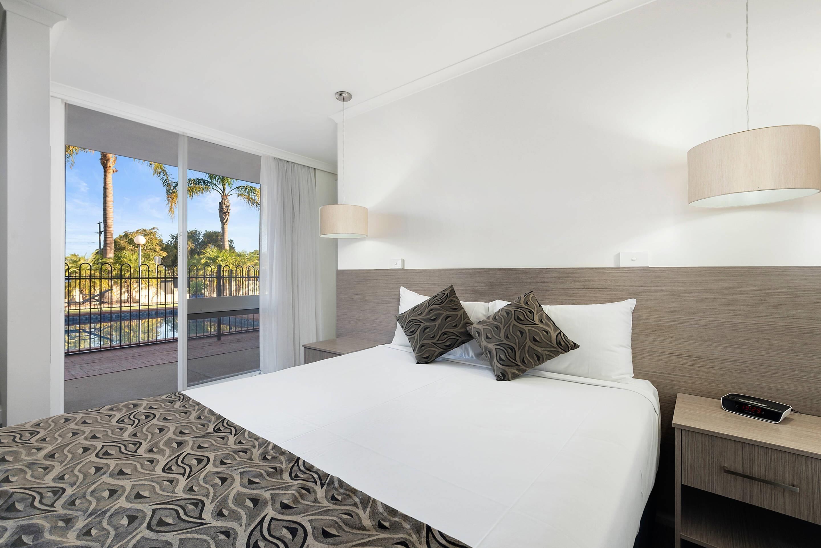 Deluxe Room, Multiple Beds, Non Smoking | Iron/ironing board, cribs/infant beds, rollaway beds, free WiFi