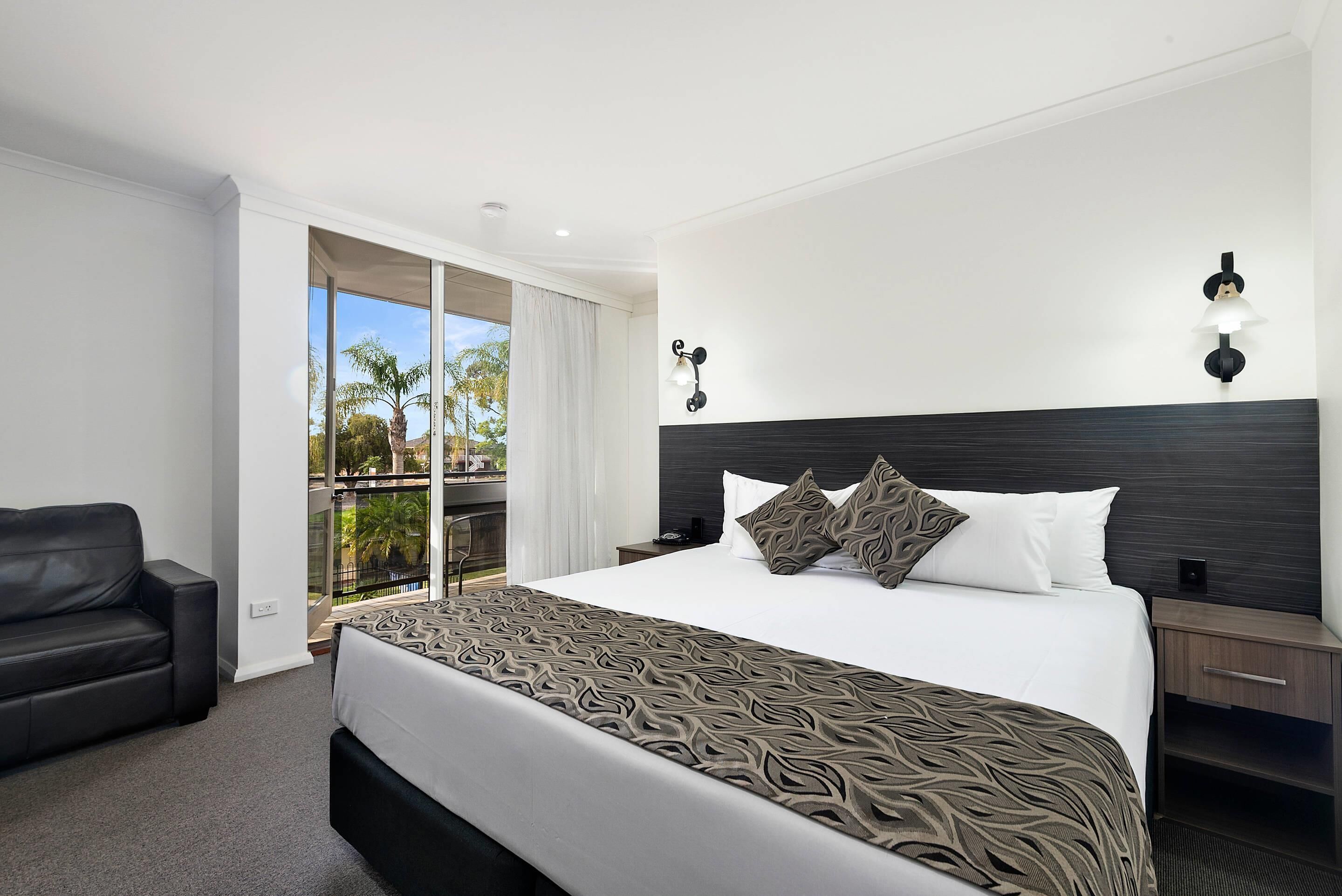 Deluxe Room, 1 King Bed, Non Smoking, Pool View | Iron/ironing board, cribs/infant beds, rollaway beds, free WiFi