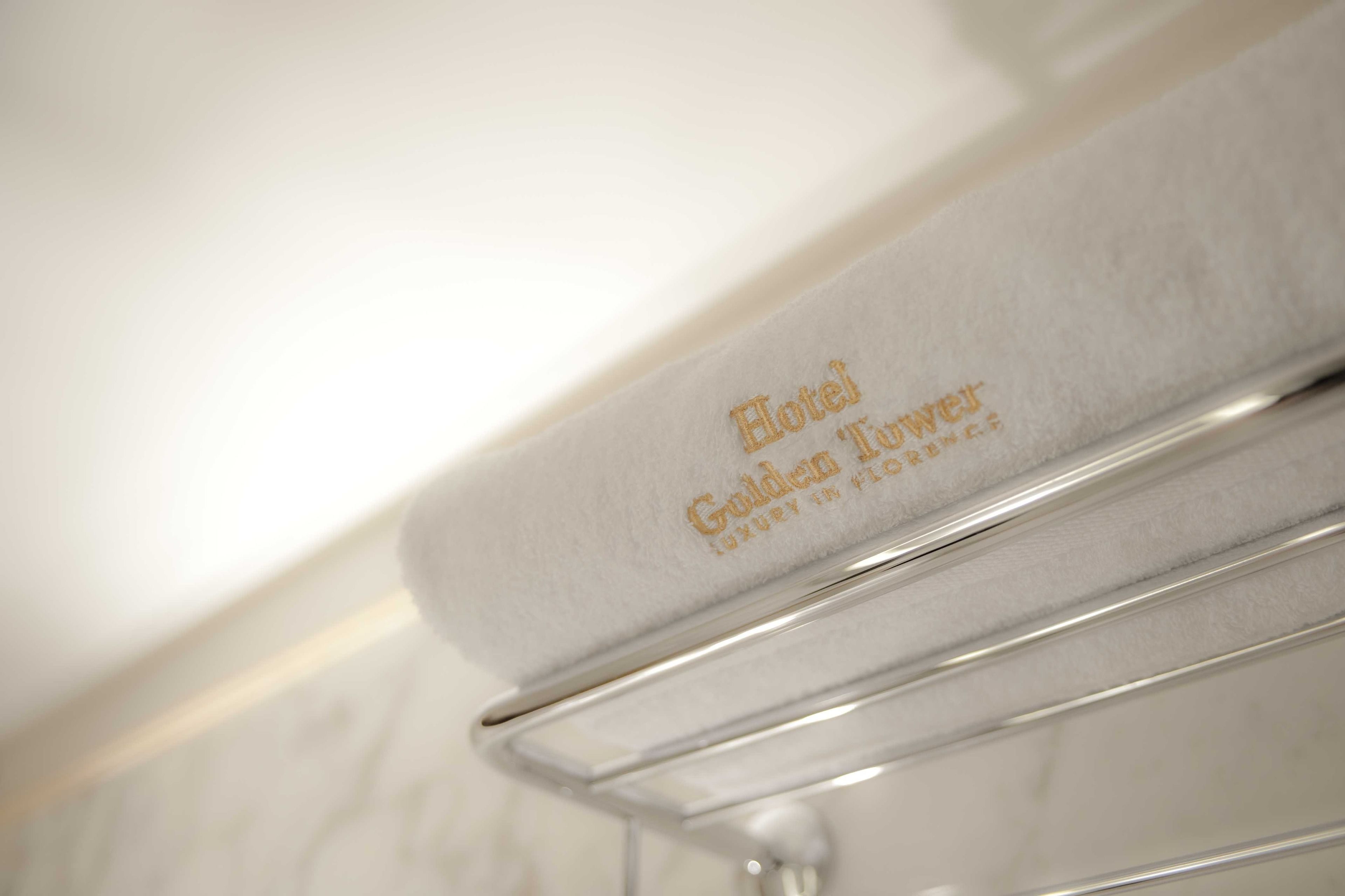 deluxe room (tower strozzi) | bathroom | rainfall showerhead, designer toiletries, hair dryer, bathrobes