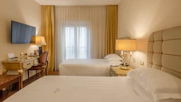 Premium bedding, down duvets, Select Comfort beds, minibar