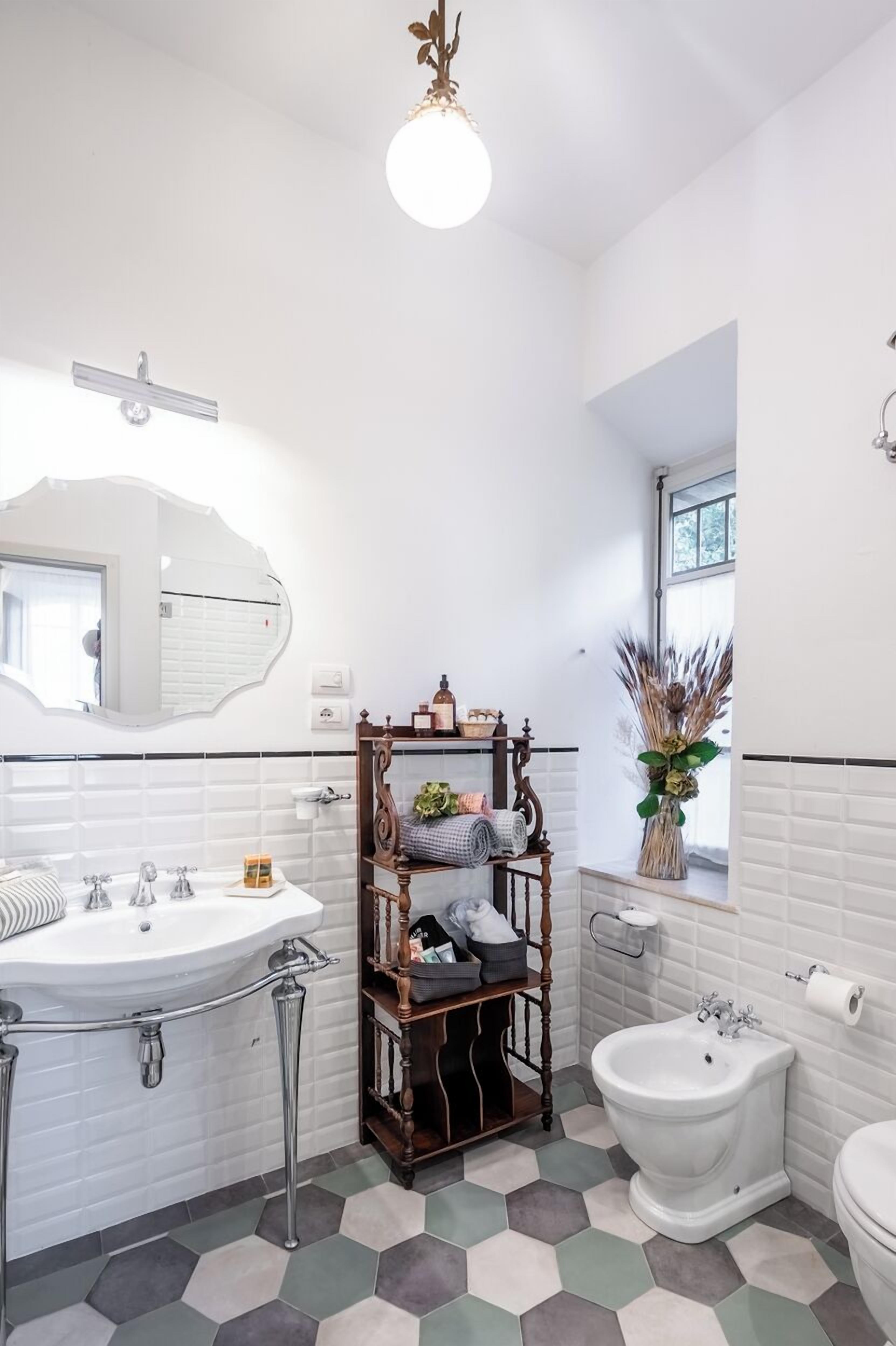 separate bathtub and shower, free toiletries, hair dryer, slippers