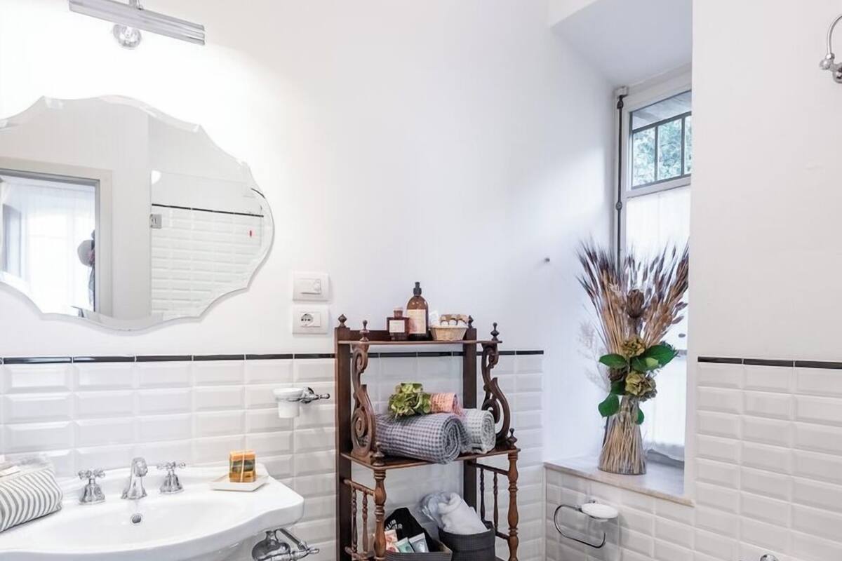 separate bathtub and shower, free toiletries, hair dryer, slippers