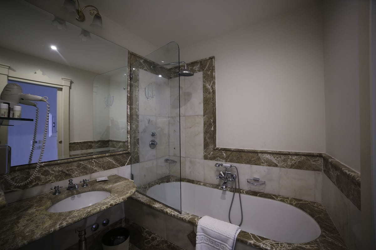 superior double room | bathroom | free toiletries, hair dryer, slippers, bidet