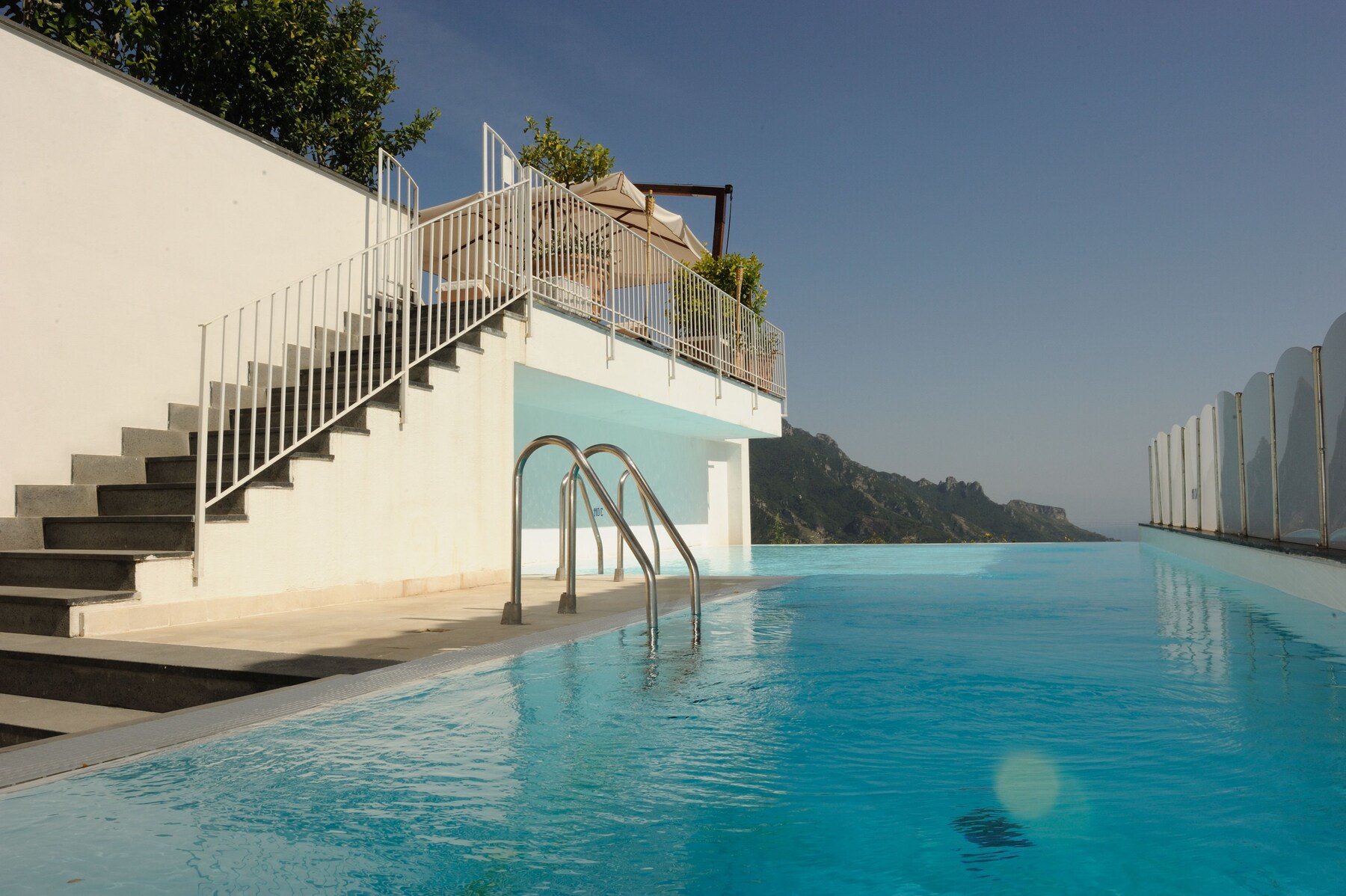 Outdoor pool, open 9:30 AM to 4:30 PM, pool loungers