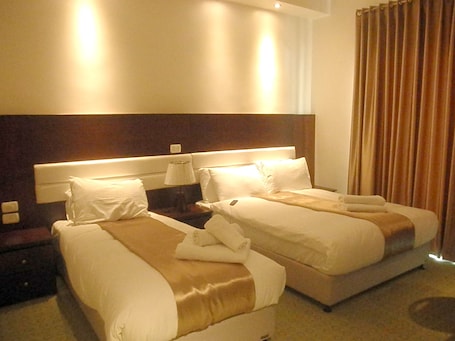 Free minibar, in-room safe, desk, iron/ironing board
