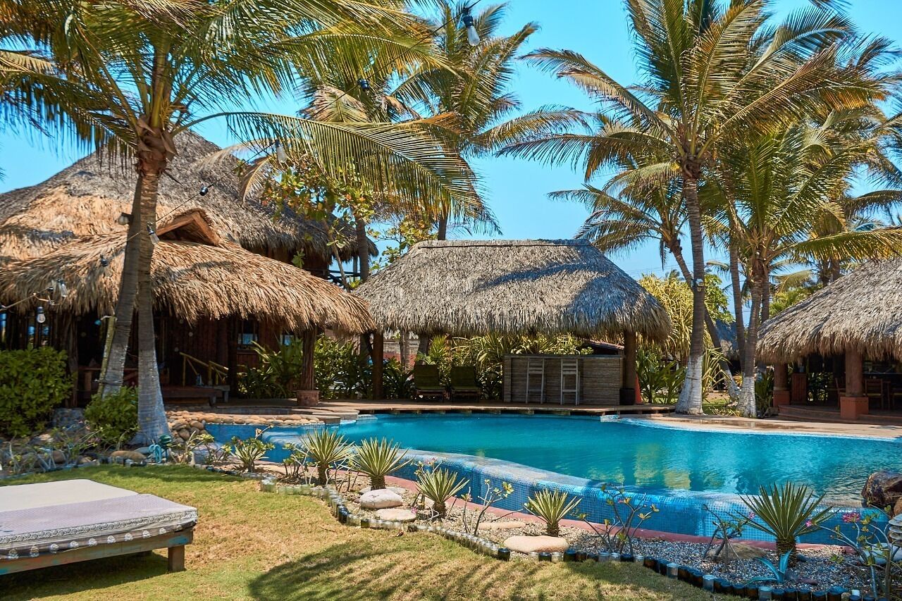 Outdoor pool, open 9 AM to 9 PM, pool umbrellas