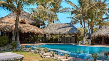 Outdoor pool, open 9 AM to 9 PM, pool umbrellas