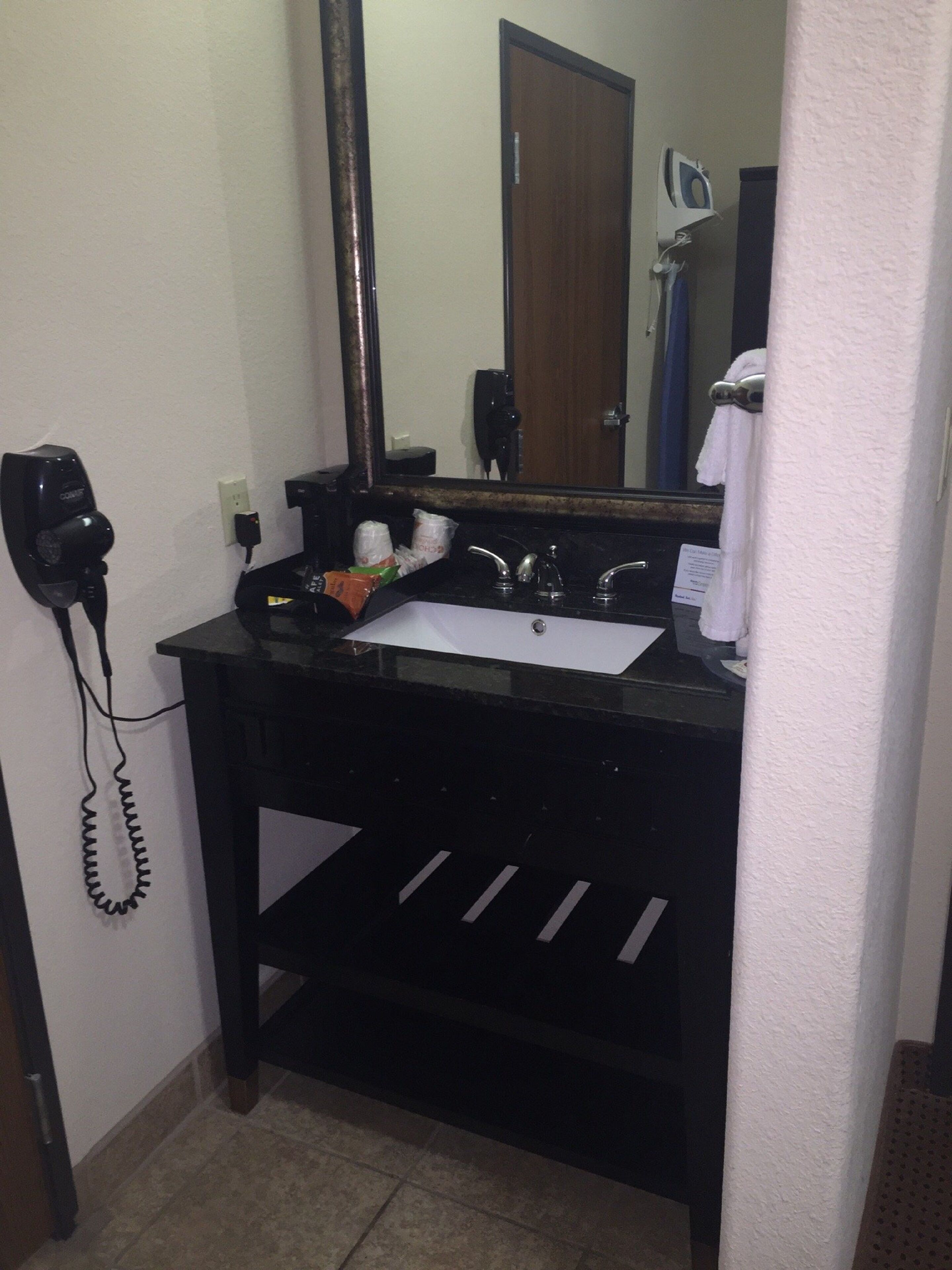 combined shower/bathtub, hair dryer, towels, soap