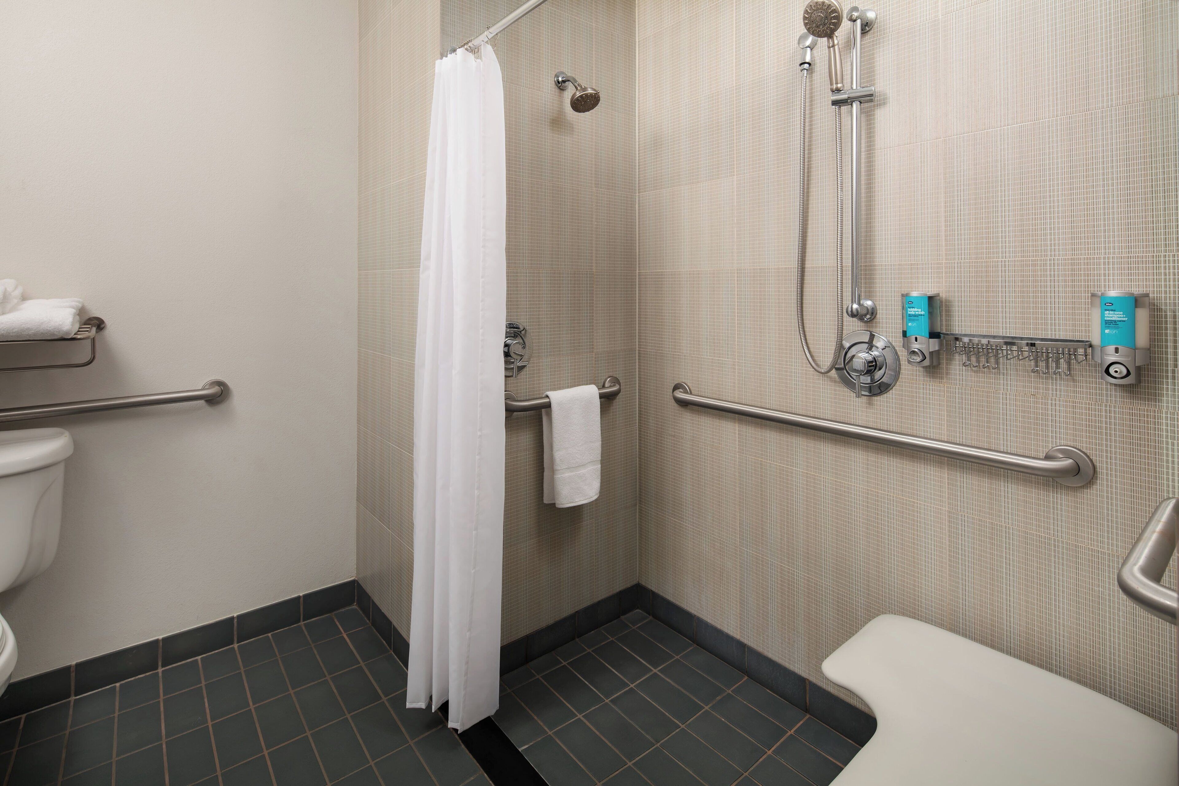 room, 2 queen beds, non smoking (mobility accessible, roll-in shower) | bathroom | shower, designer toiletries, hair dryer, towels