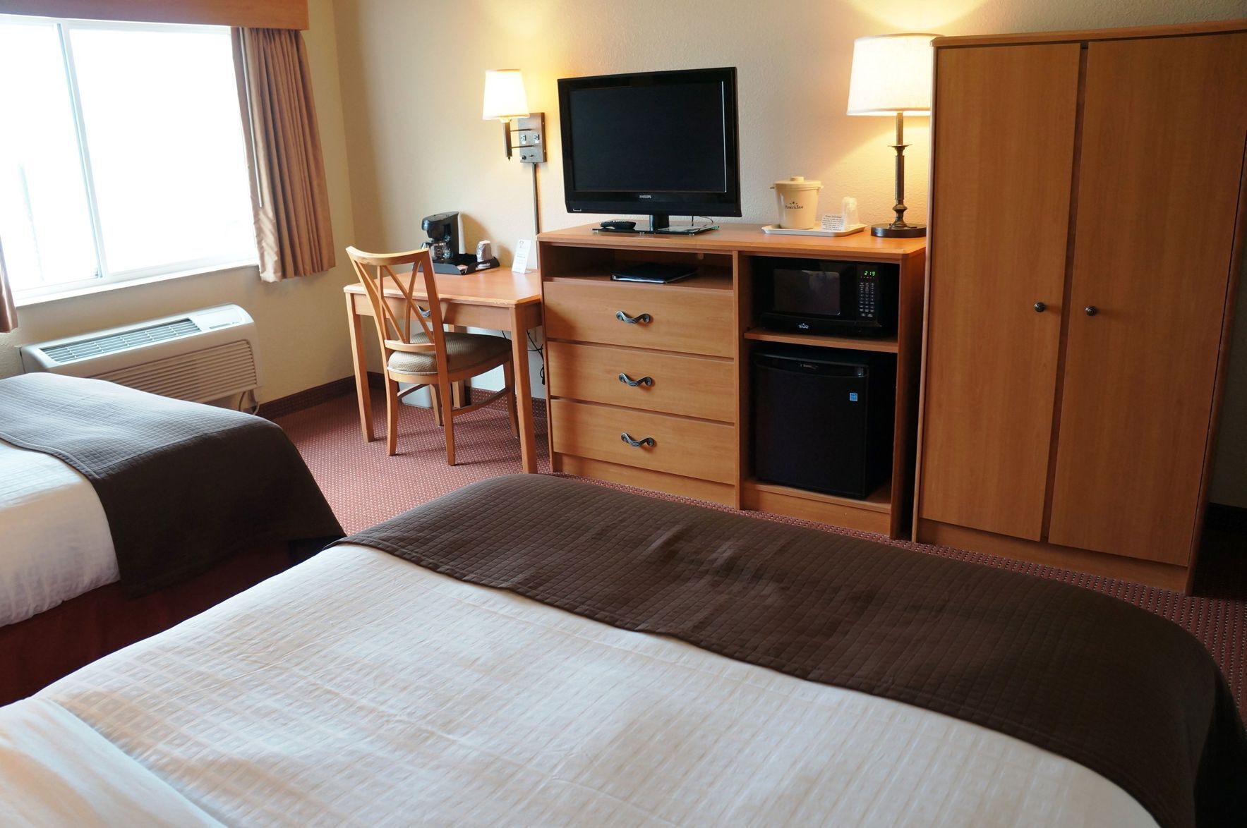 Individually decorated, individually furnished, desk, blackout curtains