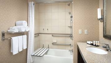 Suite, 1 King Bed, Accessible (Mobility & Hearing, Roll-in Shower) | Bathroom | Combined shower/tub, free toiletries, hair dryer, towels