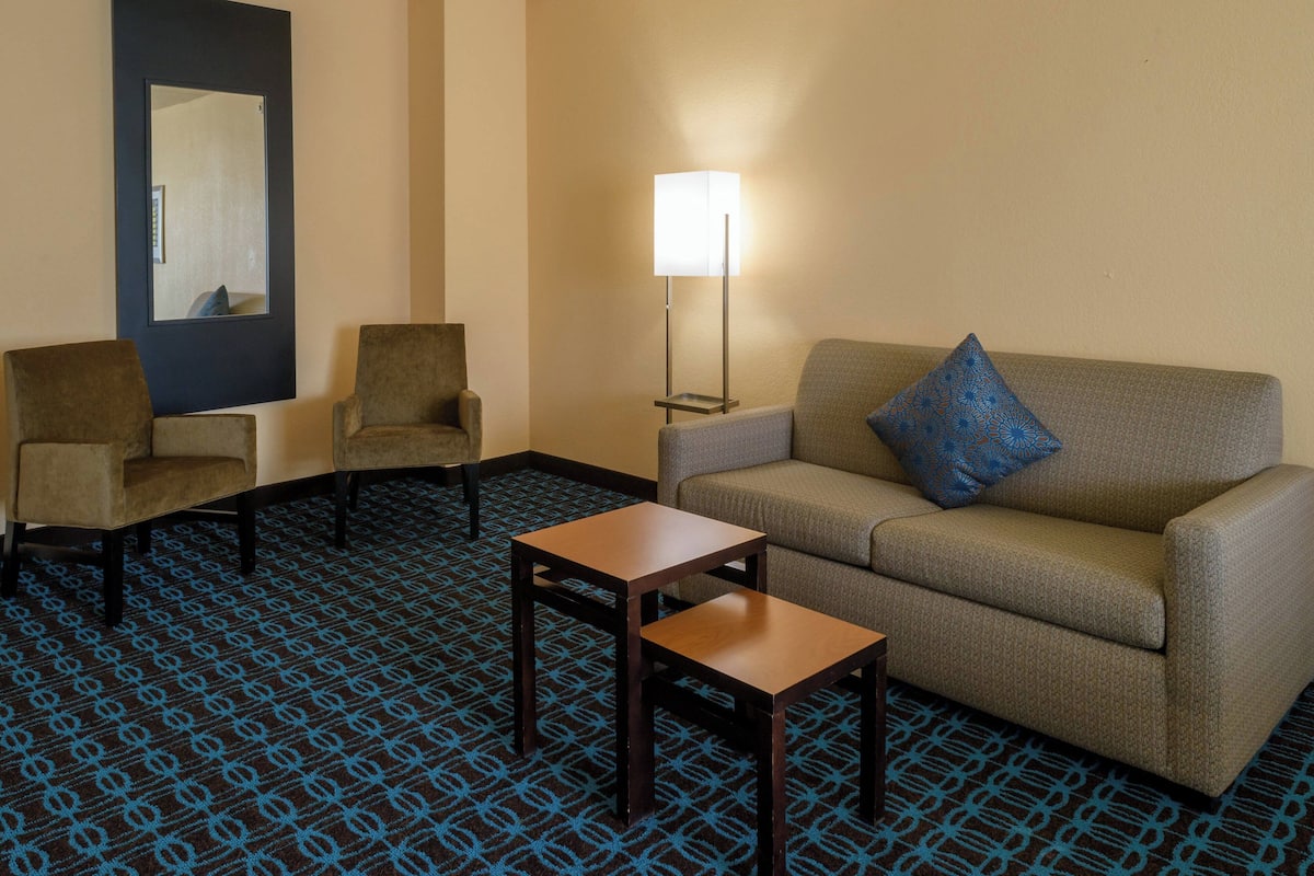 Suite, 1 Bedroom | Living area | 55-inch LED TV with satellite channels, TV, Netflix