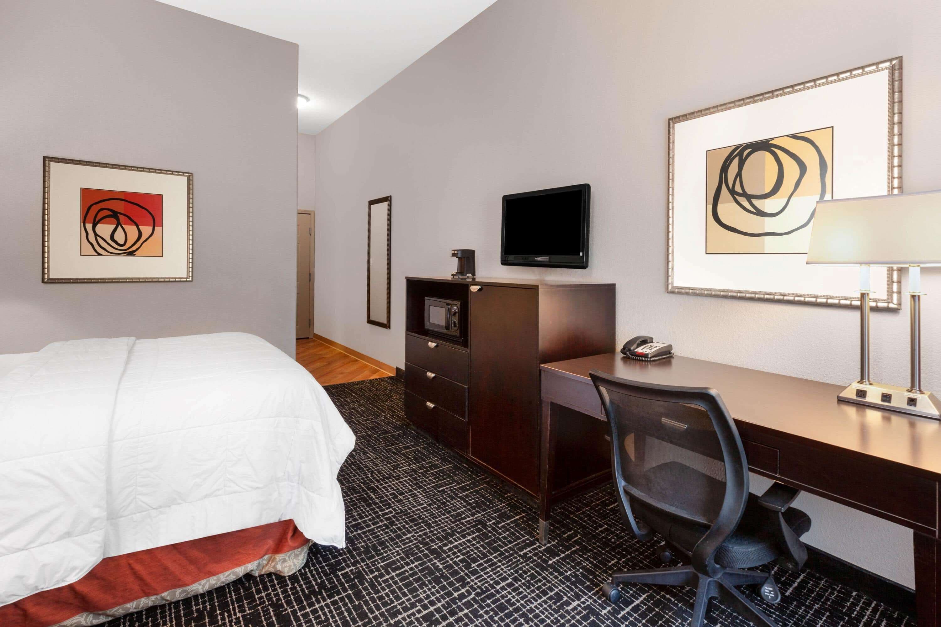 premium bedding, desk, laptop workspace, blackout curtains