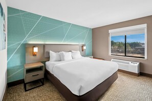 Room, 1 King Bed | Pillowtop beds, in-room safe, desk, iron/ironing board