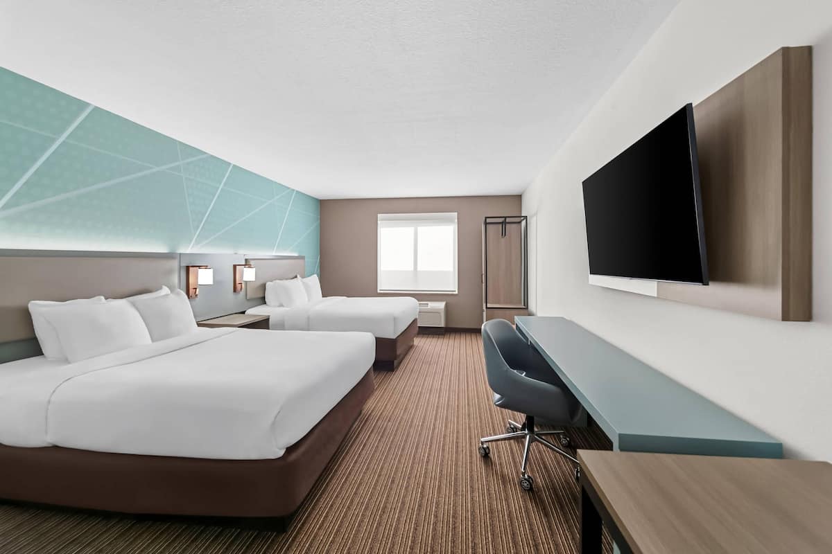 Suíte, acessível, para não fumantes | Camas com colchões pillow-top, cofres nos quartos, escrivaninha