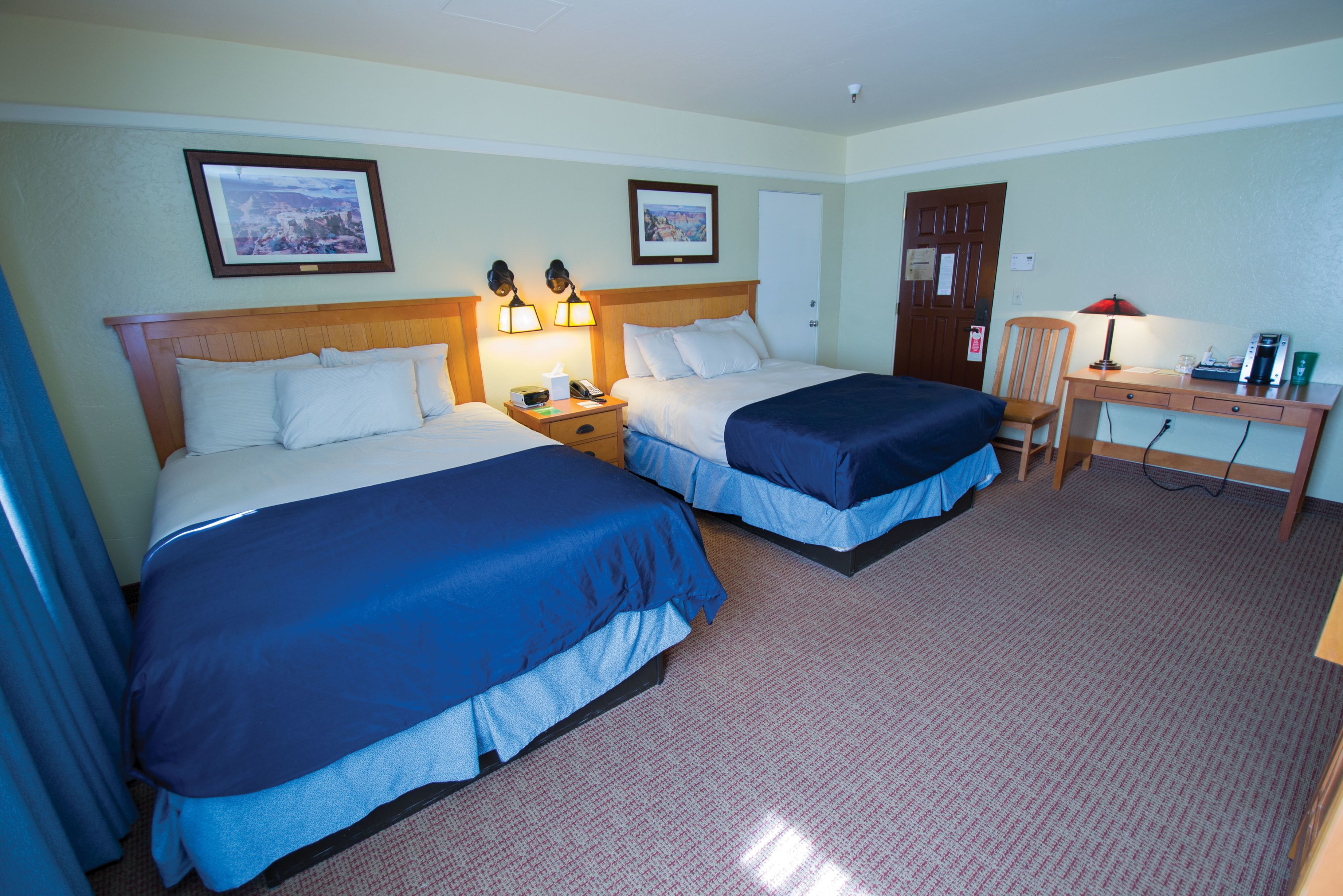 deluxe room, 2 queen beds | in-room safe, desk, iron/ironing board, rollaway beds
