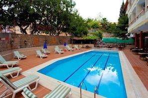 Outdoor pool, pool umbrellas, pool loungers