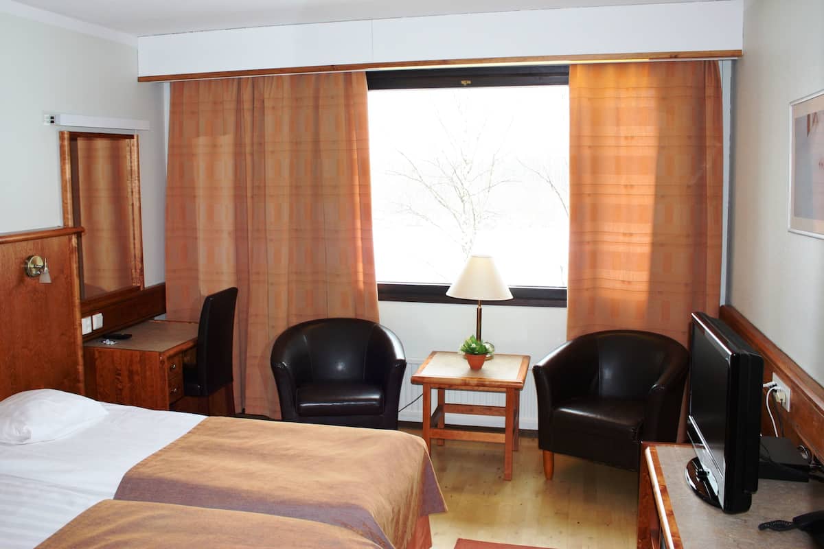 Select Comfort beds, desk, blackout curtains, iron/ironing board
