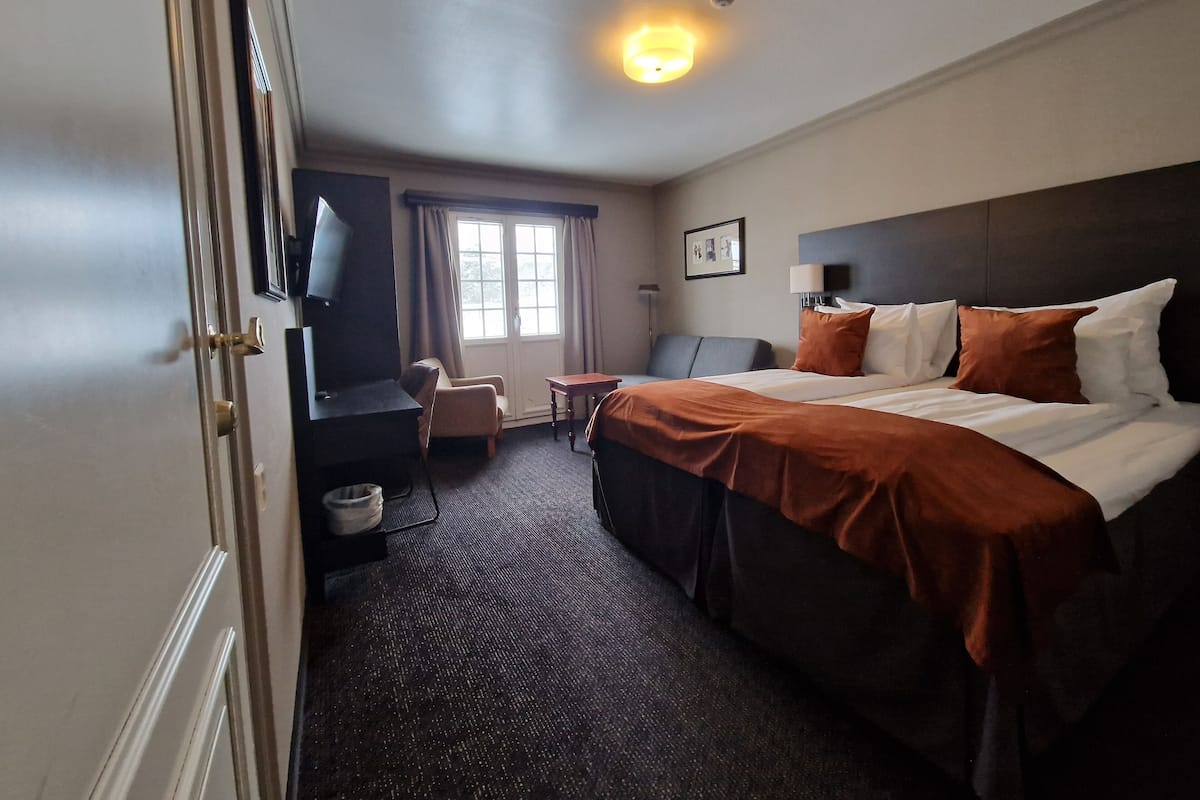 Familierom med terrasse | 1 slaapkamer, donzen dekbedden, pillowtop-bedden