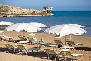 Private beach, white sand, free beach shuttle, snorkeling