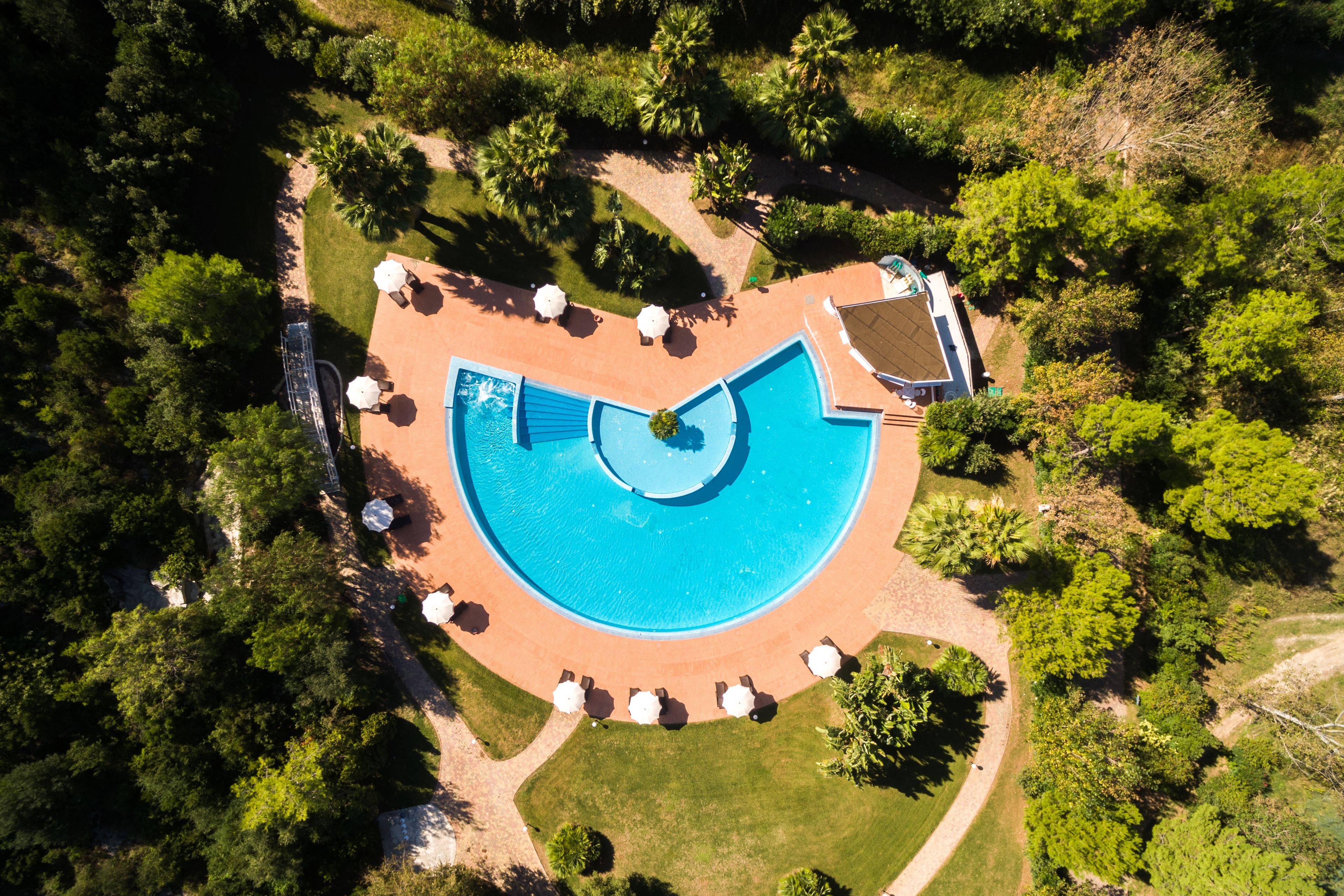 Indoor pool, open 10:00 AM to 7:00 PM, pool umbrellas, sun loungers