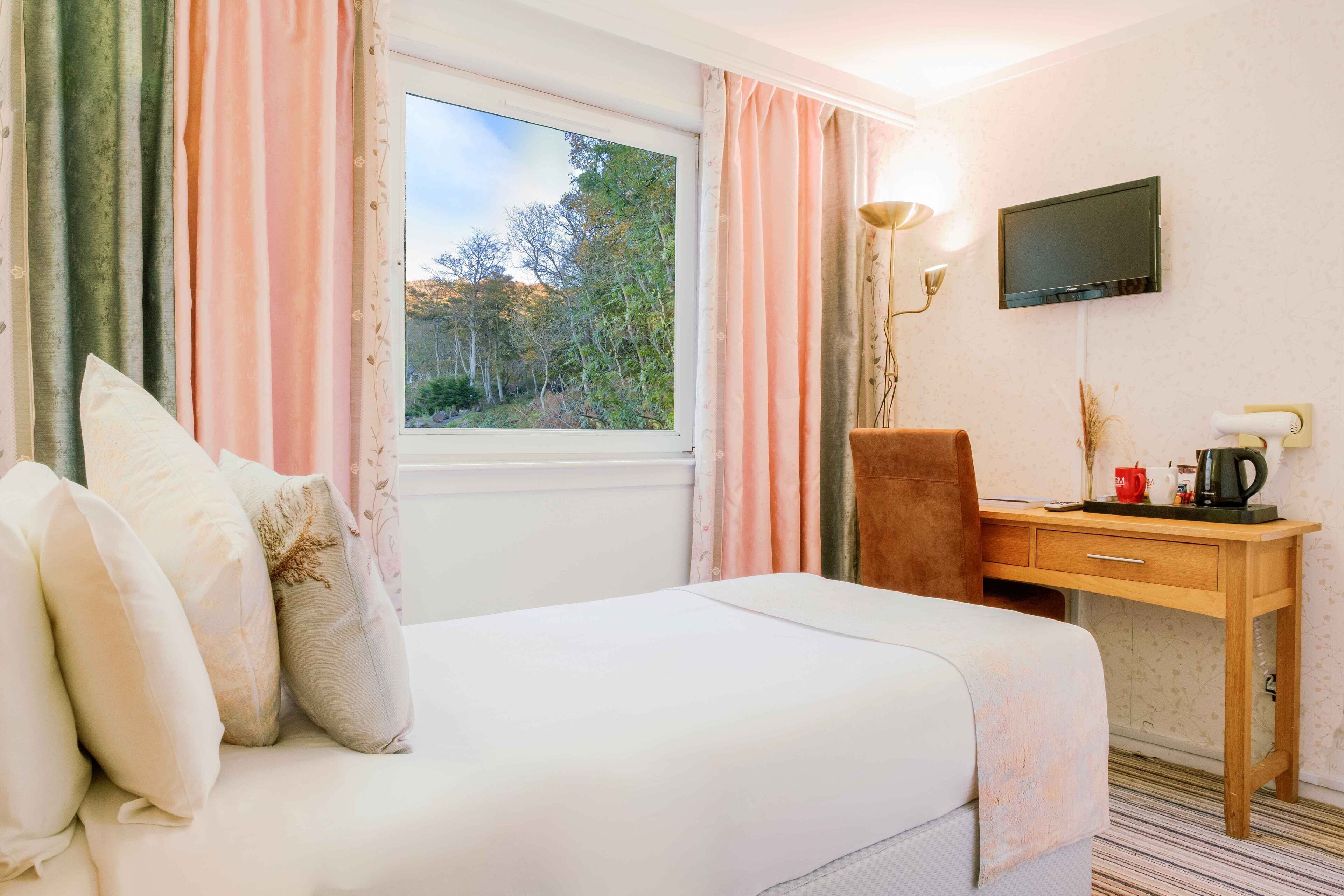 Standard Single Room | In-room safe, desk, iron/ironing board, bed sheets