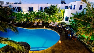 Outdoor pool, open 8:30 AM to 8:30 PM, pool loungers