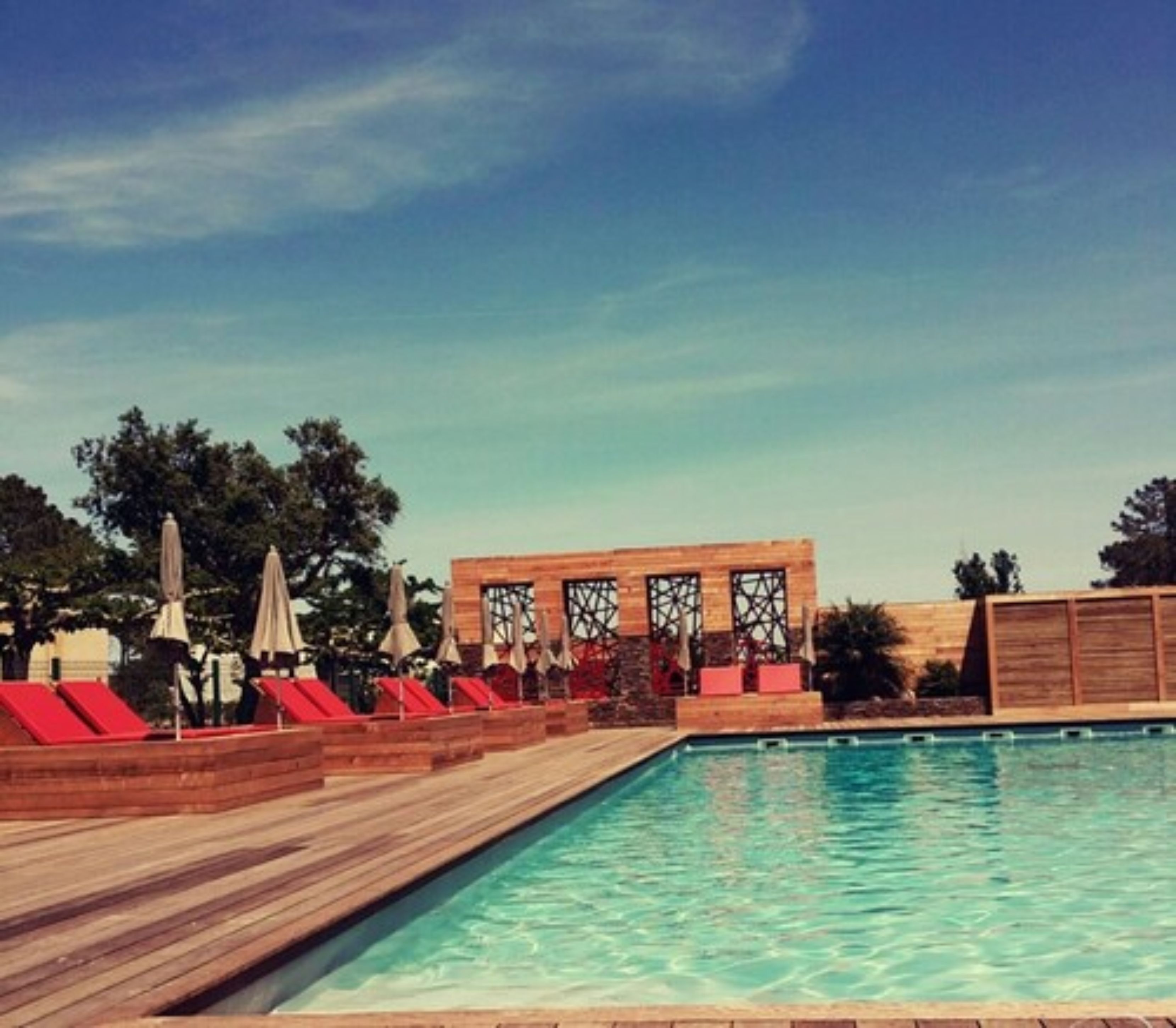 outdoor pool, pool umbrellas, pool loungers